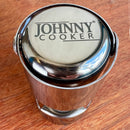 Stopper Hermético para Espumantes Johnny Cooker em aço inox polido, vedação interna em silicone com dupla trava de segurança que se adapta a garrafas de espumantes em geral